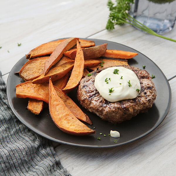 Grass-Fed Bison Burger with Garlic Aioli and Sweet Potato Wedges