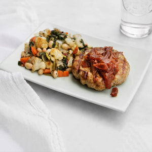 Grilled Organic Free-Range Turkey Burger with Bacon Relish, White Beans, Spinach and Roasted Cauliflower