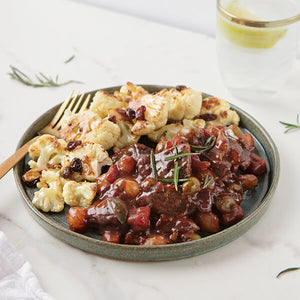 Sicilian Grass-Fed Beef Stew with Roasted Cauliflower, Raisins and Pine Nuts