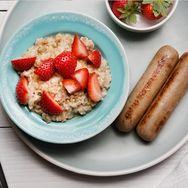 Strawberries and Cream Steel Cut Oatmeal with Breakfast Sausage